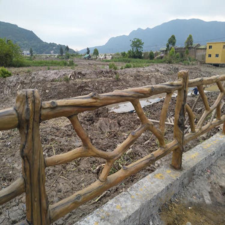 水泥仿樹皮欄桿 景區(qū)河道安全防護(hù)欄 仿樹二扶手圍欄 源頭工廠三匯市政